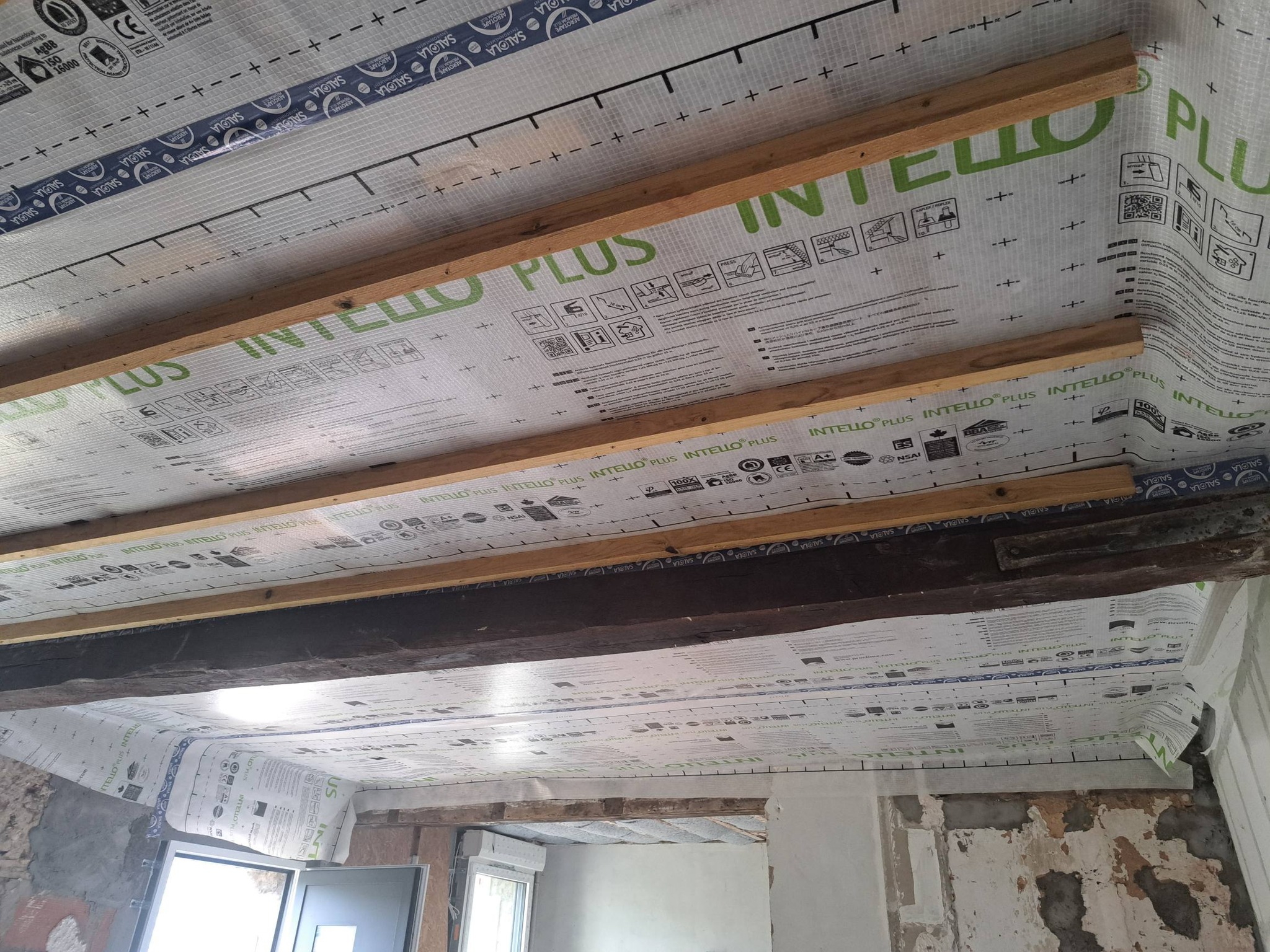 Membrane Intello Plus et isolation sous charpente — ITI Dagicour